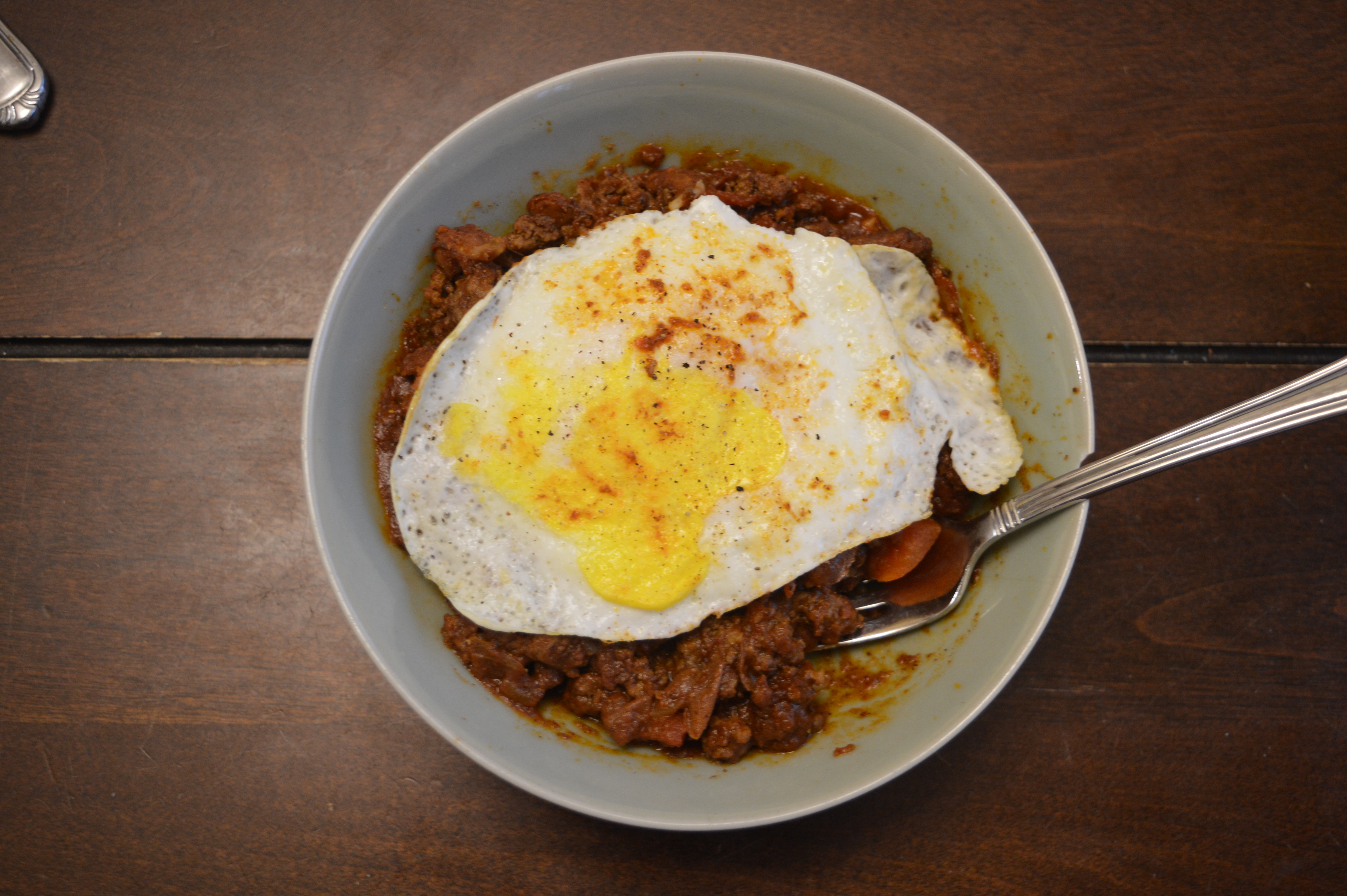 chili rice fried egg breakfast bowl